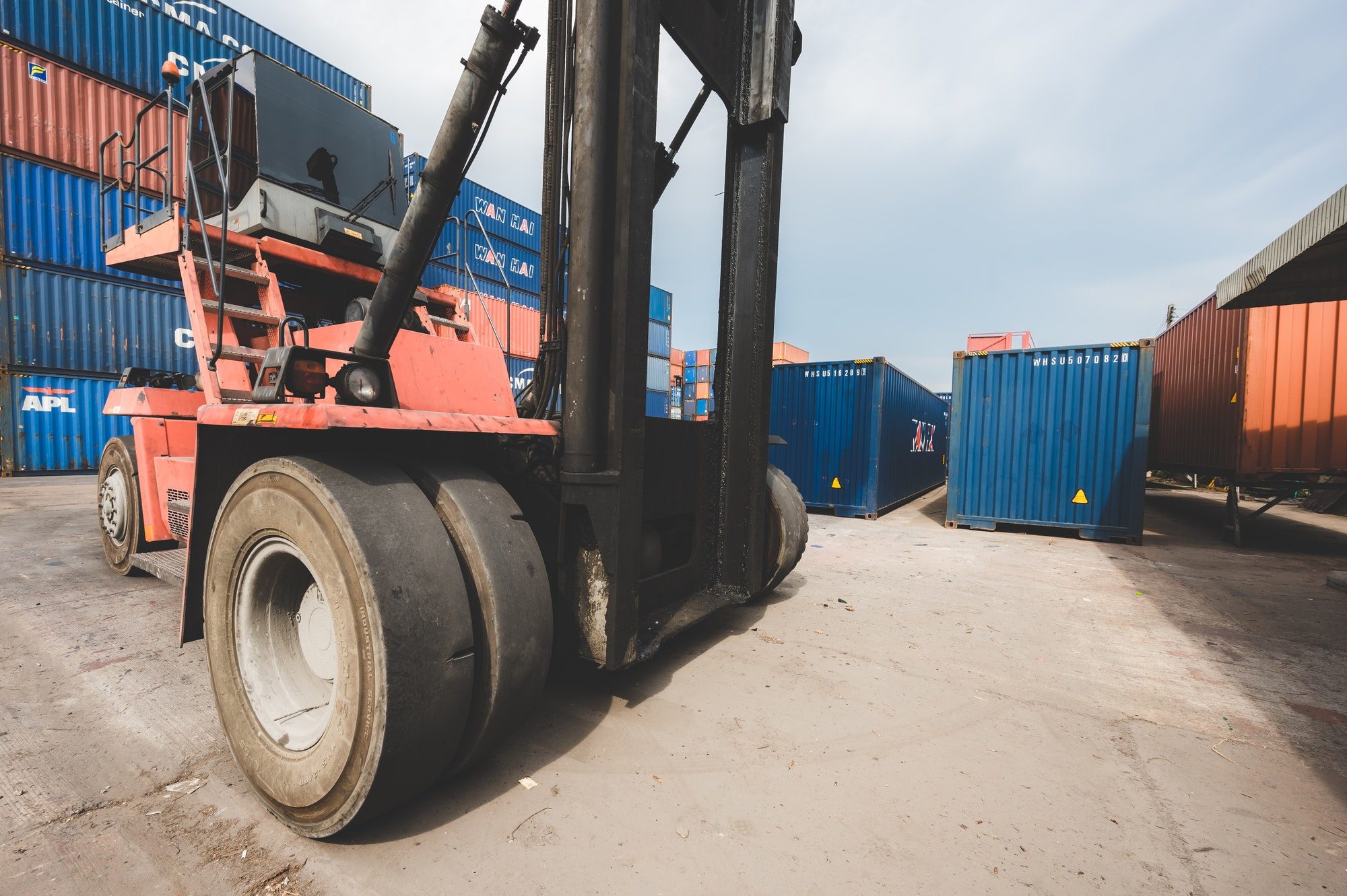 foreman team are working at container yard, logistic cargo warehouse for industrial shipping